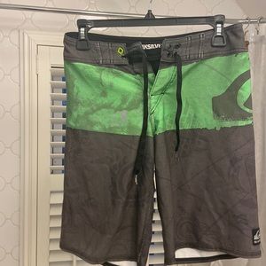 Quicksilver board shorts, boys size 25 inch waist, 9/10, back zipper pocket